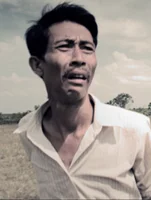 Sok Polynn, playing the Travelling Wedding Musician in the Cambodian supernatural drama, FREEDOM DEAL: Story of Lucky