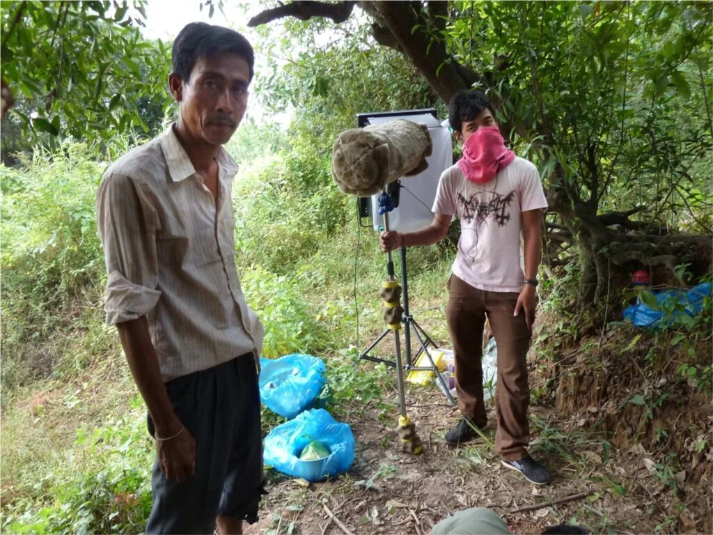 Sok Polynn (L) as 'Nuon the tro Khmer player with Tieng Ratha (R) recording sound for 'Freedom Deal: Story of Lucky'