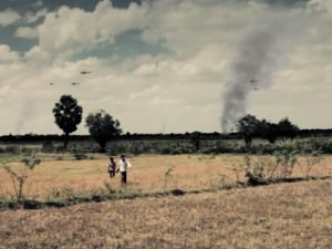 Protagonists head away from the conflict in FREEDOM DEAL: Story of Lucky, a movie by filmmaker writer-director Jason Rosette