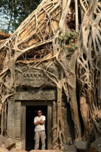 Writer-Director Jason Rosette stands in a doorway at Ta Prohm, Angkor Wat